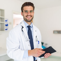 Doctor holding a tablet in a medical setting